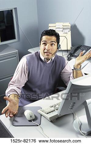 Customer service representative talking on a headset View Large Photo Image Stock Photograph - Customer service representative talking on a headset. Fotosearch