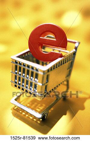 Stock Photo - E-commerce symbol on a shopping cart. Fotosearch