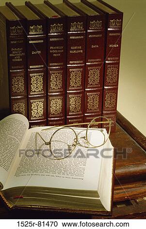 Eyeglasses on an open book View Large Photo Image Stock Image - Eyeglasses on an open book. Fotosearch