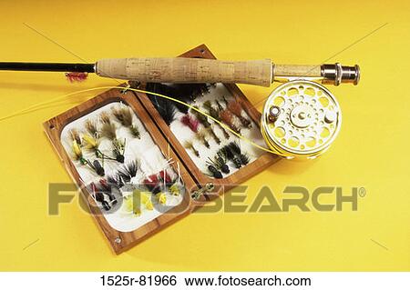 Fishing rod on a box of fishing lures View Large Photo Image Stock Photograph - Fishing rod on a box of fishing lures. Fotosearch