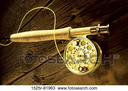 Stock Image - Fishing rod with a reel. Fotosearch