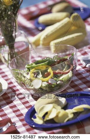 Food served on a picnic table View Large Photo Image Stock Photo - Food served on a picnic table. Fotosearch