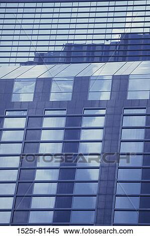 Glass front of a skyscraper View Large Photo Image Stock Photography - Glass front of a skyscraper. Fotosearch