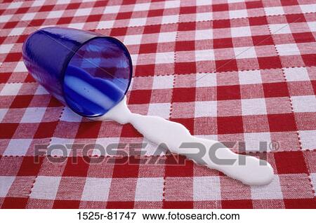 Glass of spilt milk View Large Photo Image Stock Photo - Glass of spilt milk. Fotosearch