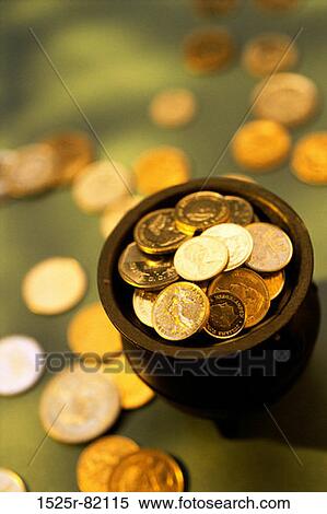 Gold coins in a pot View Large Photo Image Stock Photography - Gold coins in a pot. Fotosearch