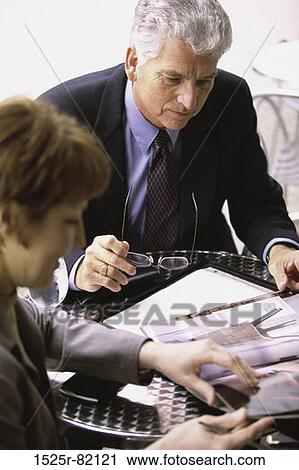 High angle view of a businessman and a businesswoman View Large Photo Image Stock Image - High angle view of a businessman and a businesswoman. Fotosearch