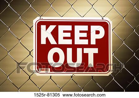 Stock Photography - Keep out sign on a chain-link fence. Fotosearch