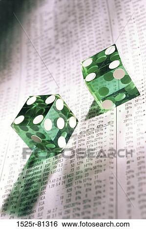 Pair of dice on a financial report View Large Photo Image Stock Photograph - Pair of dice on a financial report. Fotosearch