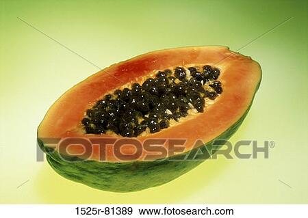 Papaya cut in half View Large Photo Image Stock Photo - Papaya cut in half. Fotosearch