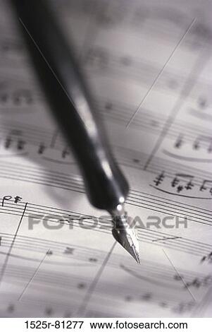 Pen on sheet music View Large Photo Image Stock Photo - Pen on sheet music. Fotosearch