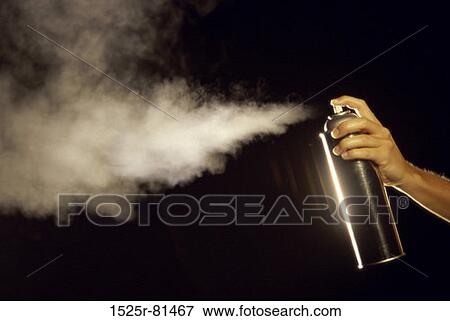 Person using a spray can View Large Photo Image Stock Photo - Person using a spray can. Fotosearch