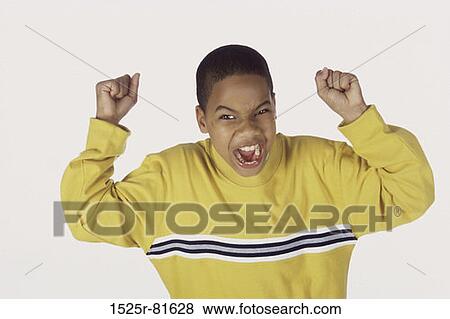 Portrait of a boy shouting in anger View Large Photo Image Stock Photo - Portrait of a boy shouting in anger. Fotosearch