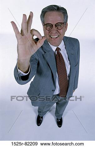 Portrait of a businessman gesturing with his hands View Large Photo Image Stock Photo - Portrait of a businessman gesturing with his hands. Fotosearch