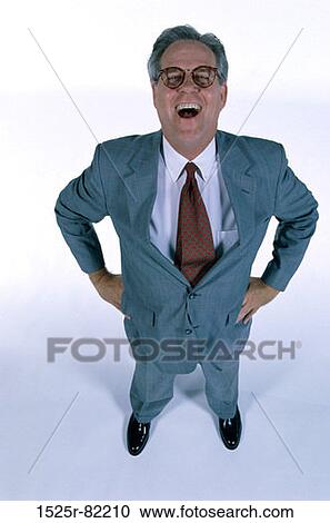 Portrait of a businessman laughing View Large Photo Image Stock Image - Portrait of a businessman laughing. Fotosearch
