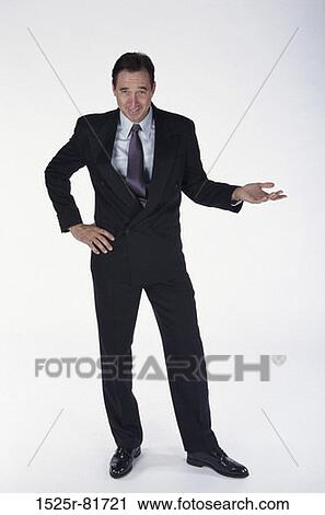 Portrait of a businessman smiling View Large Photo Image Stock Image - Portrait of a businessman smiling. Fotosearch