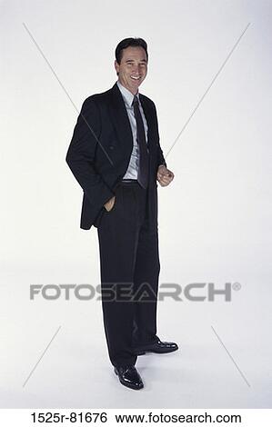 Portrait of a businessman smiling View Large Photo Image Stock Photograph - Portrait of a businessman smiling. Fotosearch