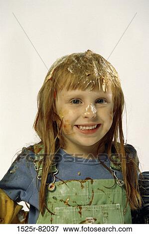 Portrait of a messy girl smiling View Large Photo Image Stock Photo - Portrait of a messy girl smiling. Fotosearch