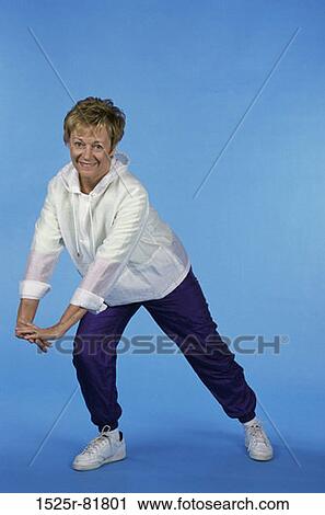 Portrait of a senior woman exercising View Large Photo Image Stock Image - Portrait of a senior woman exercising. Fotosearch