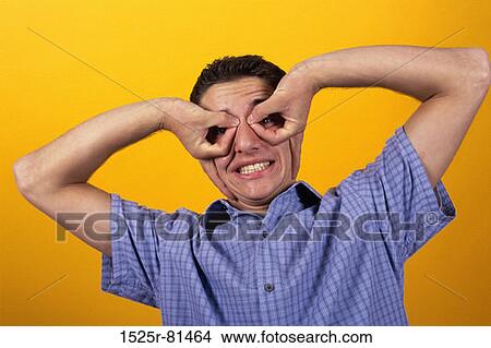 Portrait of a teenage boy making a face View Large Photo Image Picture - Portrait of a teenage boy making a face. Fotosearch