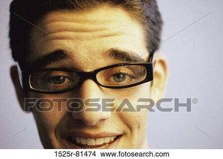 Portrait of a teenage boy smiling View Large Photo Image Picture - Portrait of a teenage boy smiling. Fotosearch