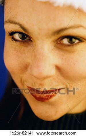 Portrait of a young woman smiling View Large Photo Image Stock Image - Portrait of a young woman smiling. Fotosearch