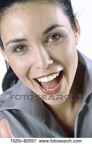 Stock Photo - Portrait of a young woman smiling. Fotosearch