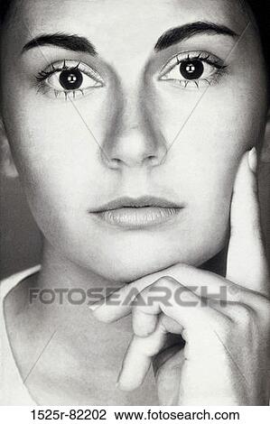 Stock Image - Portrait of a young woman's face. Fotosearch