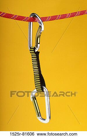Rock climbing rope and a carabiner View Large Photo Image Stock Photograph - Rock climbing rope and a carabiner. Fotosearch