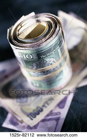 Roll of yen banknotes View Large Photo Image Stock Image - Roll of yen banknotes. Fotosearch