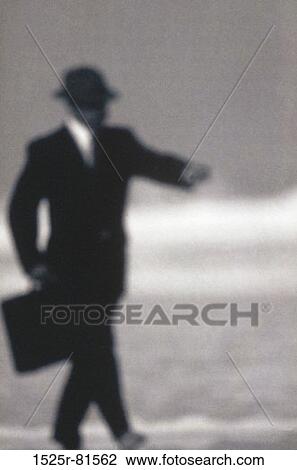 Side profile of a businessman holding a briefcase View Large Photo Image Stock Image - Side profile of a businessman holding a briefcase. Fotosearch