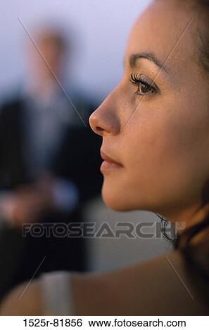 Stock Photograph - Side profile of a young woman. Fotosearch