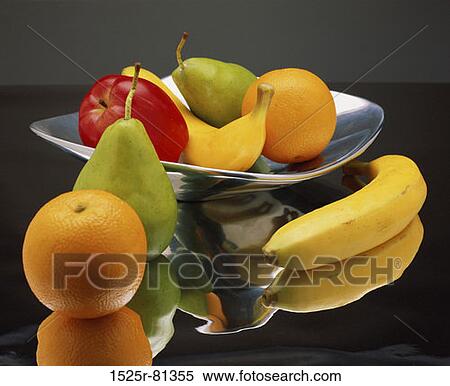 Variety of fruits in a bowl View Large Photo Image Stock Photography - Variety of fruits in a bowl. Fotosearch