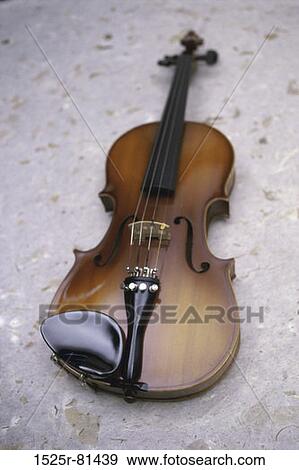 Violin on the floor View Large Photo Image Stock Photo - Violin on the floor. Fotosearch