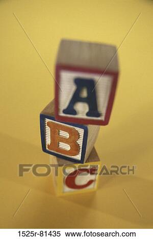Wooden alphabet blocks stacked View Large Photo Image Stock Photography - Wooden alphabet blocks stacked. Fotosearch