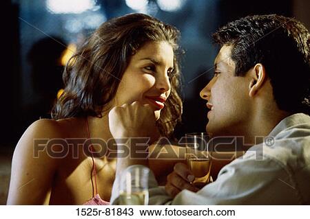 Young couple looking at each other View Large Photo Image Stock Image - Young couple looking at each other. Fotosearch