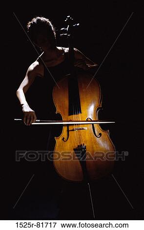 Young woman playing the cello View Large Photo Image Stock Photo - Young woman playing the cello. Fotosearch