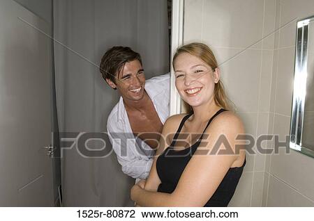 Stock Image - Young couple smiling. Fotosearch
