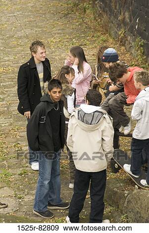 High angle view of a group of teenage boys and teenage girls View Large Photo Image Stock Photo - High angle view of a group of teenage boys and teenage girls. Fotosearch