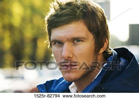 Portrait of a young man thinking View Large Photo Image Picture - Portrait of a young man thinking. Fotosearch