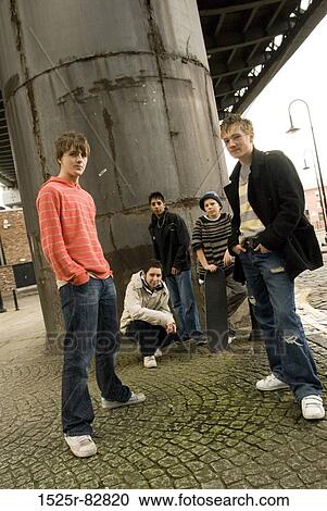 Teenage boys under a bridge View Large Photo Image Stock Image - Teenage boys under a bridge. Fotosearch