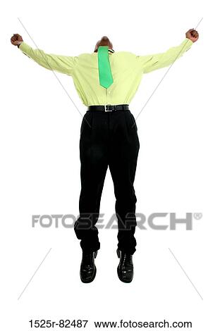 Businessman jumping with his arms outstretched View Large Photo Image Stock Photo - Businessman jumping with his arms outstretched. Fotosearch