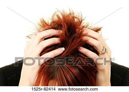 Businesswoman holding her head in her hands View Large Photo Image Picture - Businesswoman holding her head in her hands. Fotosearch