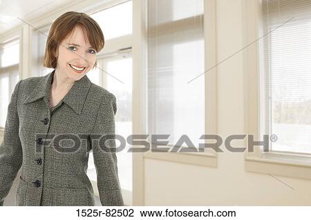 Businesswoman smiling View Large Photo Image Stock Image - Businesswoman smiling. Fotosearch