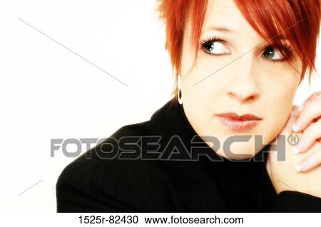 Stock Image - Close-up of a businesswoman looking serious. Fotosearch