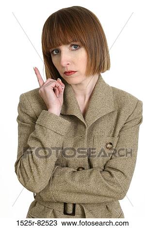 Close-up of a businesswoman pointing upward View Large Photo Image Stock Image - Close-up of a businesswoman pointing upward. Fotosearch