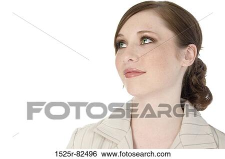 Close-up of a young woman smiling View Large Photo Image Stock Photograph - Close-up of a young woman smiling. Fotosearch