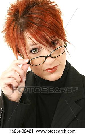 Portrait of a businesswoman adjusting her eyeglasses View Large Photo Image Stock Image - Portrait of a businesswoman adjusting her eyeglasses. Fotosearch