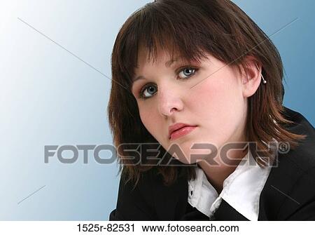 Portrait of a businesswoman looking serious View Large Photo Image Stock Image - Portrait of a businesswoman looking serious. Fotosearch