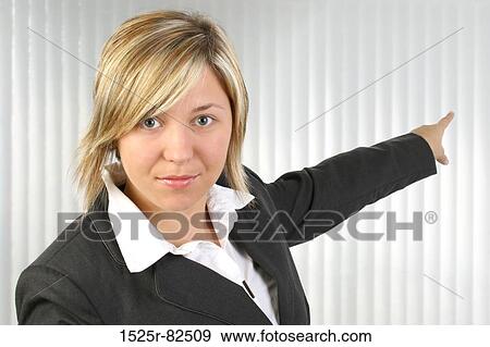 Portrait of a businesswoman pointing with her finger View Large Photo Image Stock Photo - Portrait of a businesswoman pointing with her finger. Fotosearch