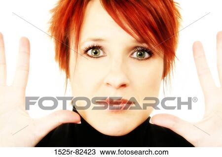 Portrait of a mid adult woman gesturing View Large Photo Image Stock Image - Portrait of a mid adult woman gesturing. Fotosearch